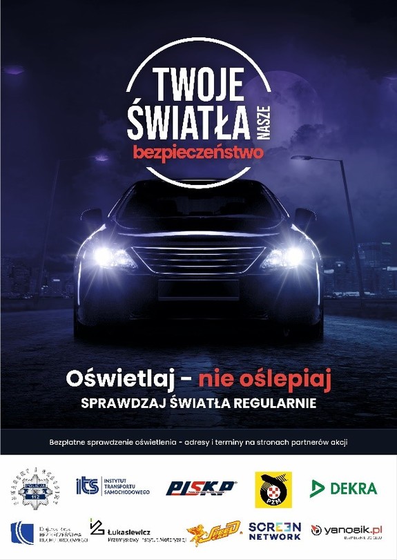 Zdjęcie dekoracyjne przedstawiające plakat kampanii. W jego głównej części widać napis &quot;Twoje światła nasze bezpieczeństwo&quot;. Na środku grafiki znajduje się samochód osobowy z włączonymi światłami. Poniżej loga partnerów i organizatorów przedsięwzięcia.